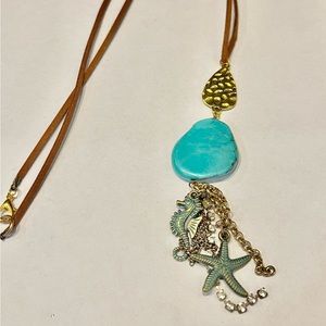 Beautiful boho long necklace with beach charms